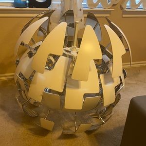 Designer light, connects through ceiling cords.